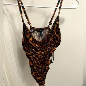 Cheetah print body suit